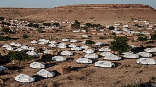 Tigrayan family reunites in a refugee camp after fleeing Ethiopia's conflict
