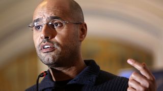 Libya's election body bars Gaddafi's son from vying for presidency