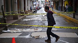 Mexico earthquake: furniture shakes in building as people gather outside